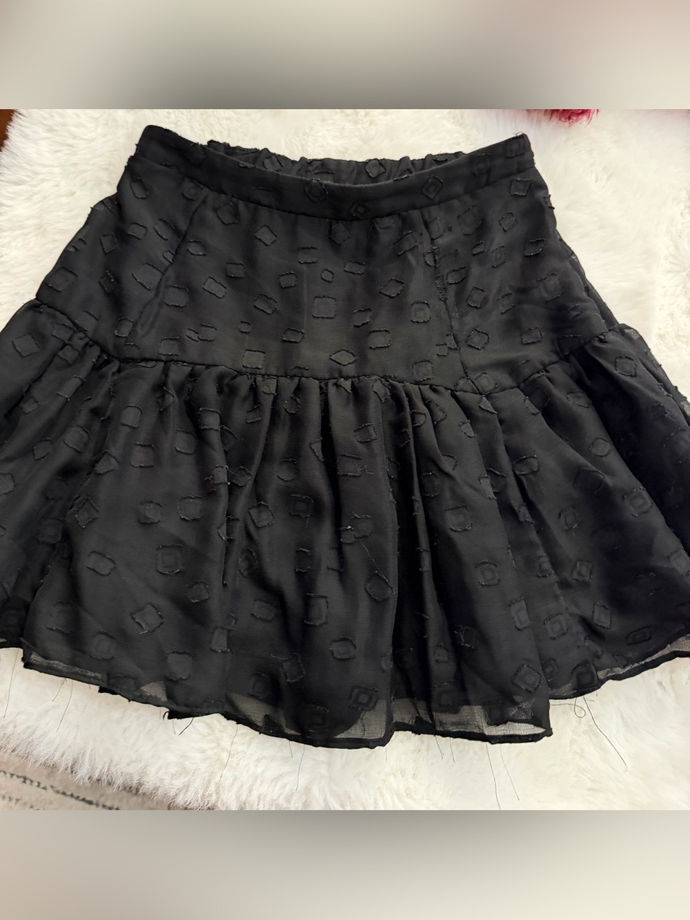 vestique Black Textured Ruffle-Hem Mini Skirt